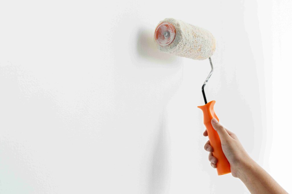 Hand painting wall white