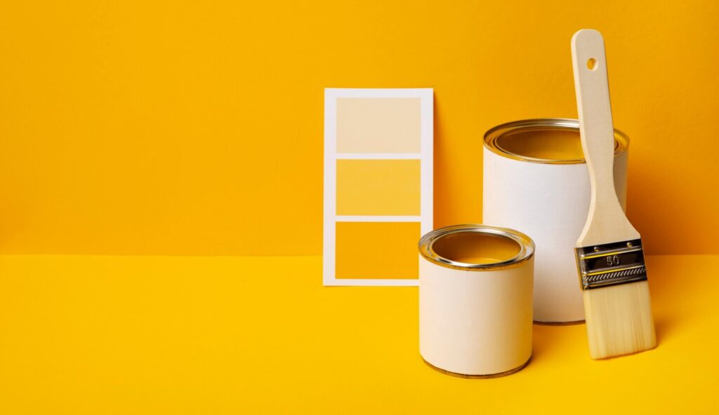 cans with yellow paint