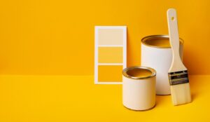 cans with yellow paint