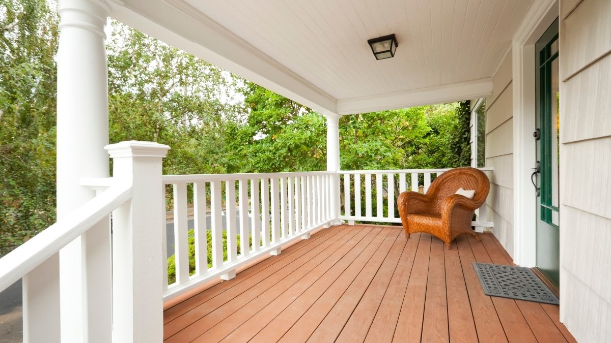 front porch with brown wood flooring